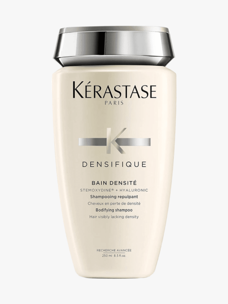 K&eacute;rastase Densifique Bain Densit&eacute; Shampoo in branded tube component with silver cap on a light gray background